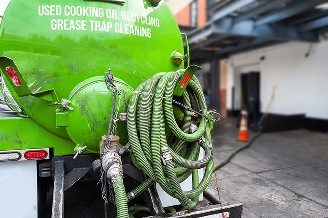 workers at Grease Trap Cleaning of Berlin